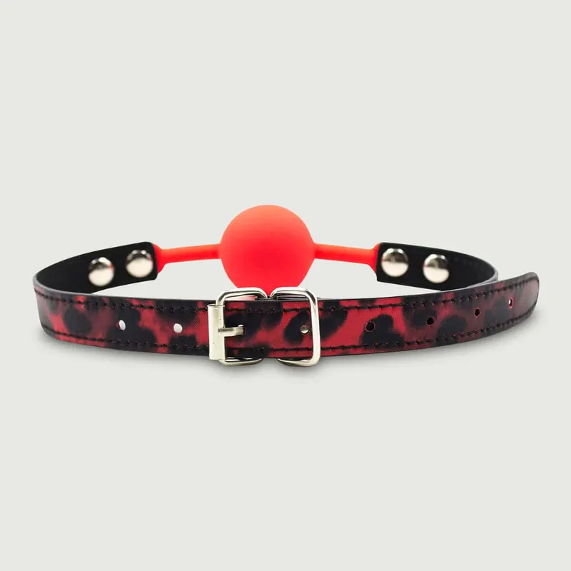 Ieftin Căluș cu bilă din silicon cu curea animal print - roșu