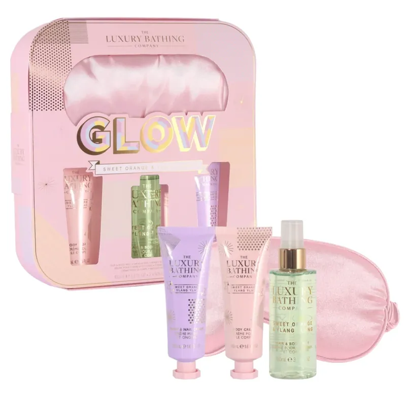 Nu rata Set cadou Nourishing Delights, Sweet Orange & Ylang Ylang, 100 ml Gel de dus, 50 ml Crema pentru maini si unghii, 50 ml Crema corp & Masca de dormit Luxury pentru ochi, The Luxury Bathing Company